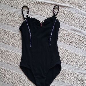 Wear Moi Black with crystals One Piece. Size S